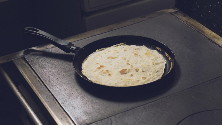 Flatbread cooking on stovetop