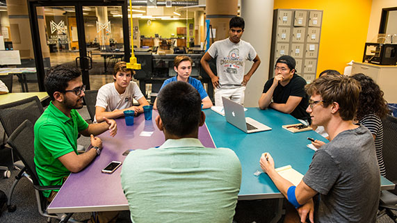 group of students sitting at table