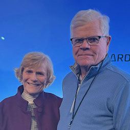 Val and Bill Hall standing together