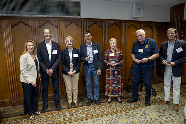 large group of people pose for a photo