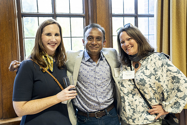 3 people pose for a photo
