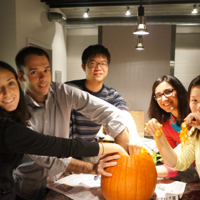 Ross exchange students participate in the American tradition of carving pumpkins.