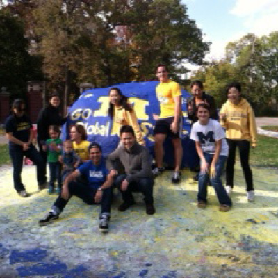 Ross exchange students participate in the University of Michigan student tradition of painting “The Rock.”