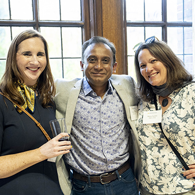 3 people pose for a photo