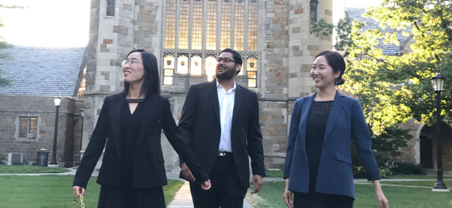 Ross PhD students outside Law Quad