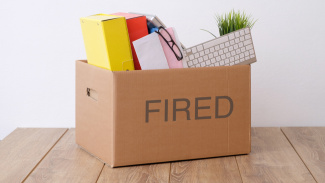 Box of personal belongings labeled "Fired"
