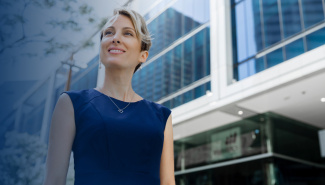 Woman in business attire looking confident