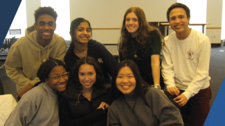 Group of seven students smiling 