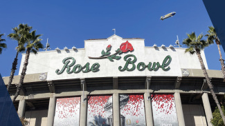 The Rose Bowl stadiun, with a blue sky in the background