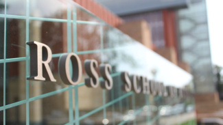 Exterior of the Ross School of Business sign on the building in Ann Arbor, Michigan. 