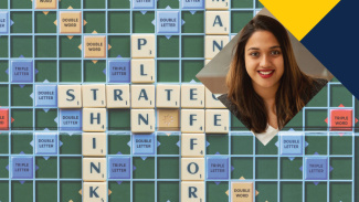 Scrabble tiles and Professor Akshina Banerjee
