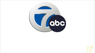 Logo featuring a silver and blue circle with the number "7" and a black circle containing the letters "abc" prominently displayed.