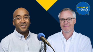 Two men smiling in front of a microphone with a "Business Made Easy" speech bubble logo.