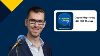 Man in a suit stands by a microphone next to "Crypto Kleptocracy with Will Thoms" podcast title.