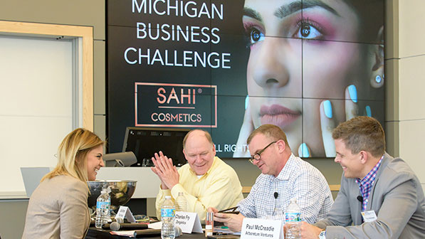 Michigan Business Challenge students interacting