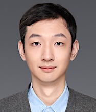 Professional headshot of Zetao Wang wearing a gray blazer and light blue shirt.