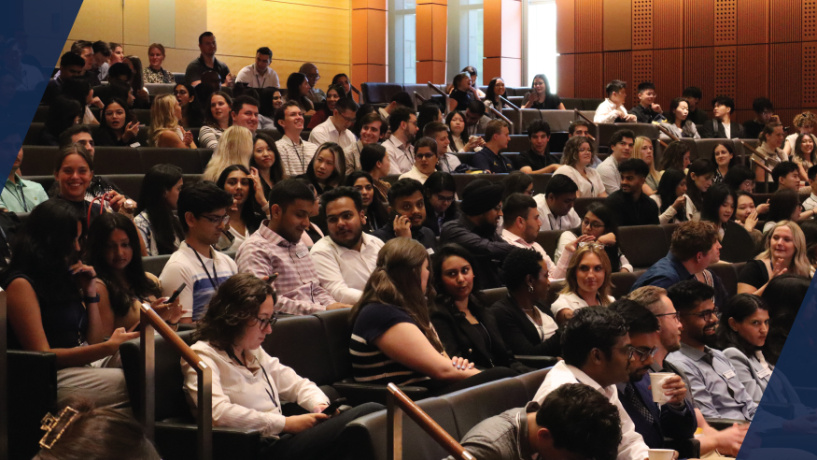 A group of students sitting in an auditorium