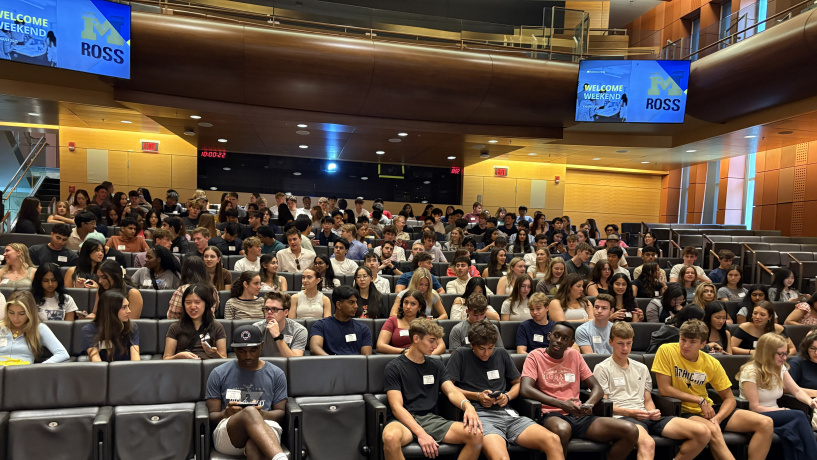 Photo of the newest class of Michigan Ross BBA students sitting in an auditorium. 