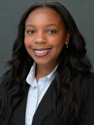 A professional headshot. 