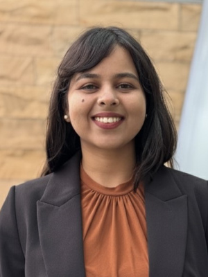 Professional headshot of a woman in business attire.