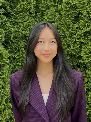 Headshot picture of girl in purple blazer