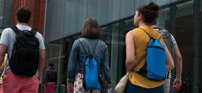 Students walking into the Ross building