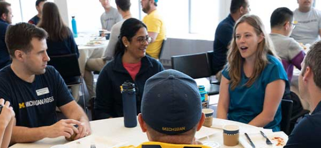 students at round table discussion