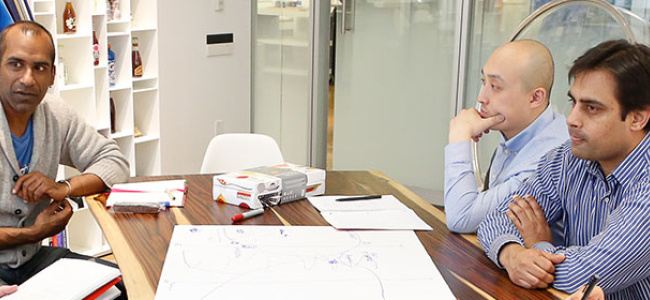 group of people working at table