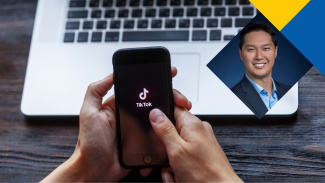 Professor Justin Huang, behind him in the background an image of a person holding a phone with TikTok open on the screen