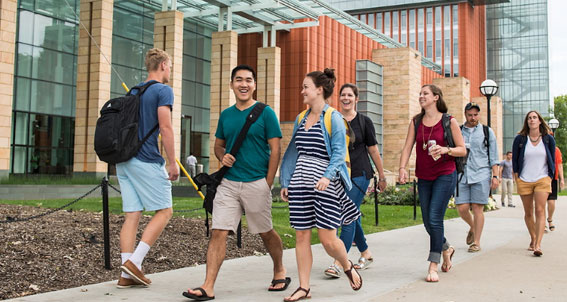 Students walking ouside of the Ross building