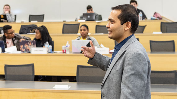 PhD student teaching in classroom