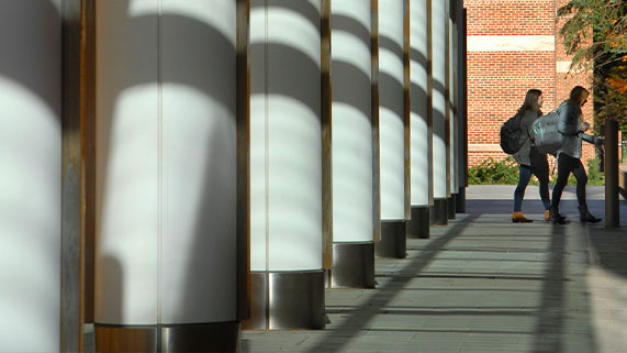 students walking outside of Michigan Ross